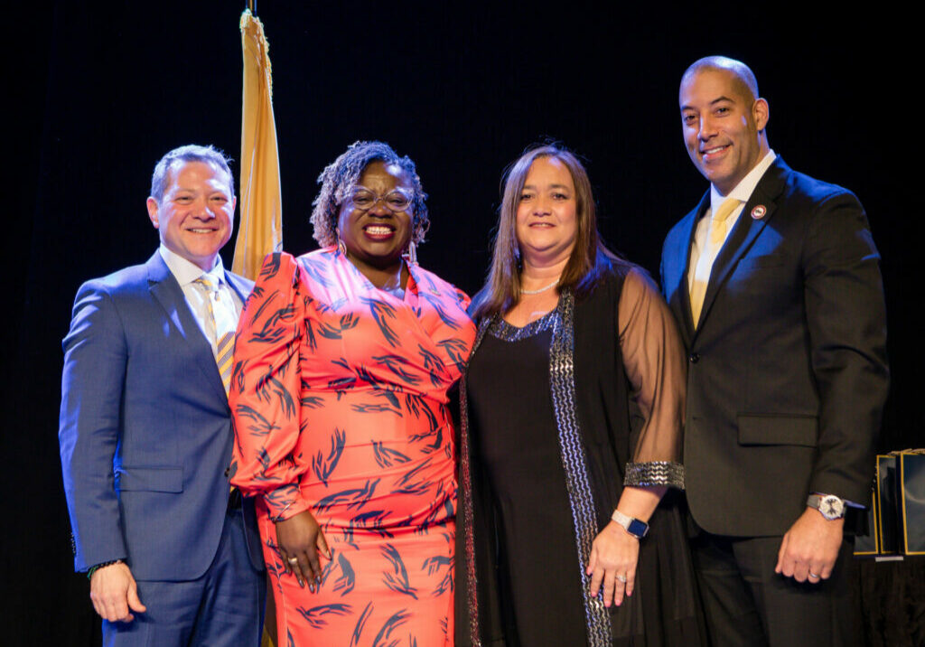 Monmouth County ESP of the Year Erika Kerwin is recognized at the NJEA ESP Conference on Feb. 2. From left: NJEA Vice President Steve Beatty, NJEA Secretary-Treasurer Petal Robertson, Kerwin, NJEA President Sean M. Spiller 