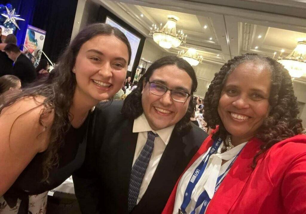 Christine Sampson-Clark (r), an NEA Executive Committee member and Trenton teacher, greets NJEA Preservice President Bianca Nicolescu and NJEA Preservice Vice President Matthew Yuro at the Aspiring Educators Conference. 